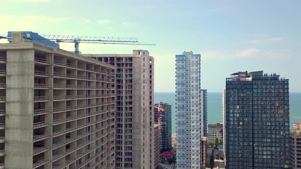 Construction of multi-storey residential building. Aerial photography. Batumi,