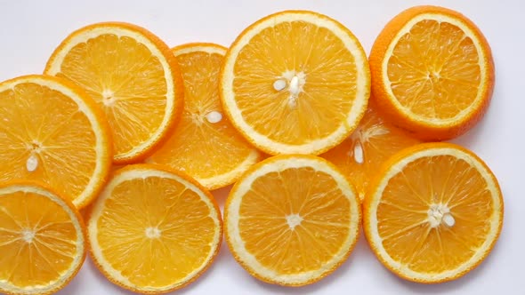 Close Up of Slice of Orange Fruit on Wooden Background