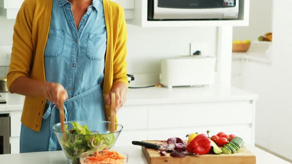 Woman preparing food together in the kitchen