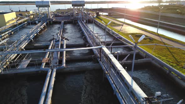 Swirling Dirty Water in Large Pools at Purification Station