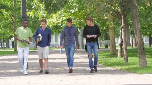 College Students Boy Walking Together on Campus