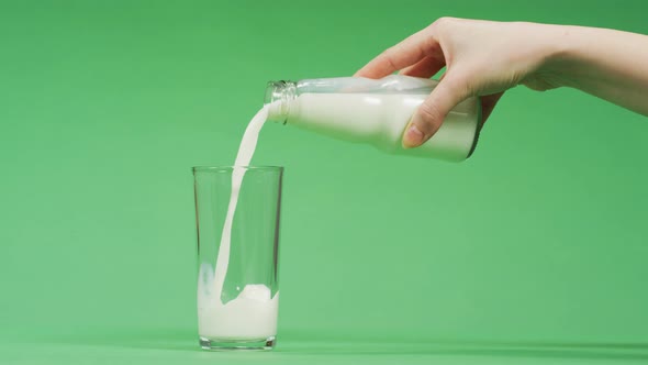 Pouring milk into glass