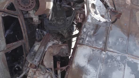 Vertical Video of a Dump of Destroyed Cars During the War in Ukraine