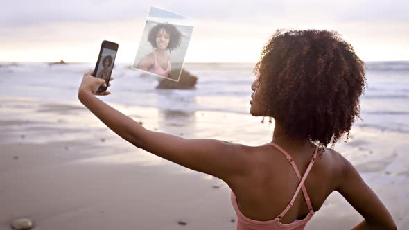 Somali woman jogging on the beach in Malibu