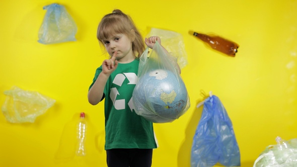 Girl Activist Makes Earth Globe Free From Plastic Package. Reduce Trash Pollution. Save Ecology