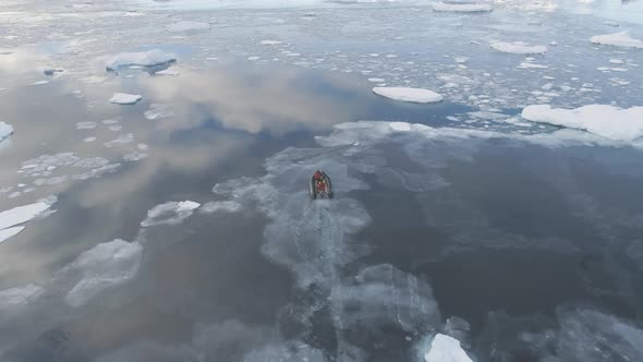 Zodiac Boat Sail Brash Ice Water Back Aerial View