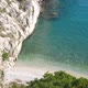 Small Hidden Beach On Adriatic Sea Coast With Calm Blue Sea - VideoHive Item for Sale