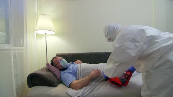 Clasic Body Temperature Measurement at home, Doctor testing patient for coronavirus.