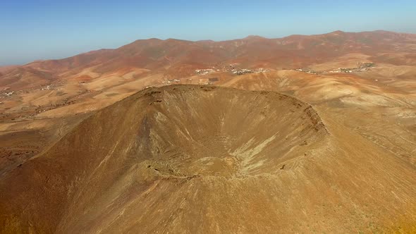 Aerial view of top of the Caldera de Gairia volcano crater in Fuerteventura.