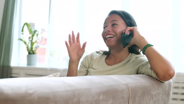 Attractive Young Woman Talking on Phone