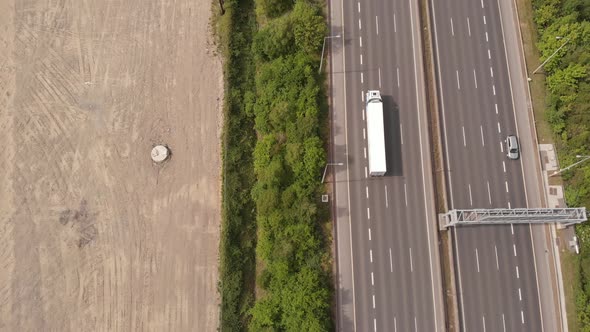 M50 Motorway In Dublin, Ireland With Nearby Land Area Ready For Construction - aerial shot