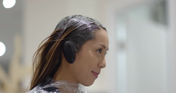 Woman with hair cut in beauty salon