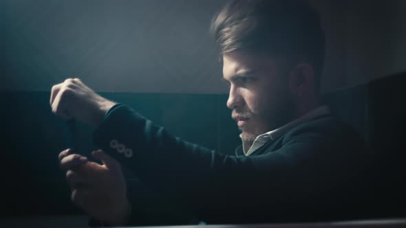 Boy Plays with Smartphone in the Bathtub