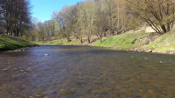 Drone Flying Low Above River