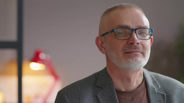 Portrait of Senior Businessman in Office