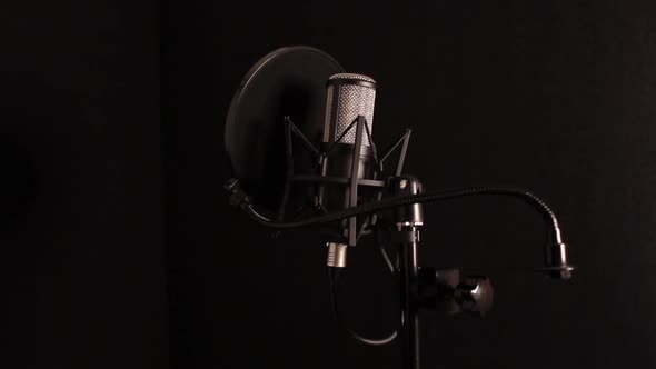 Studio Microphone on a Black Background