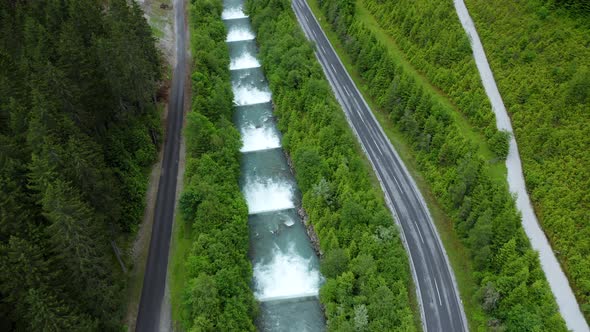 Aerial View of Mountain Road Along Cascade River Reveal Beautiful Alpine Valley