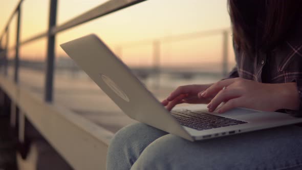 Freelancer Woman Using Laptop Outdoor Distance Studying and Remote Working