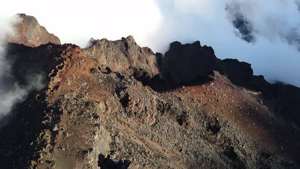 Drone footage of the mountains of the Piton des Neiges summit at the Reunion island.