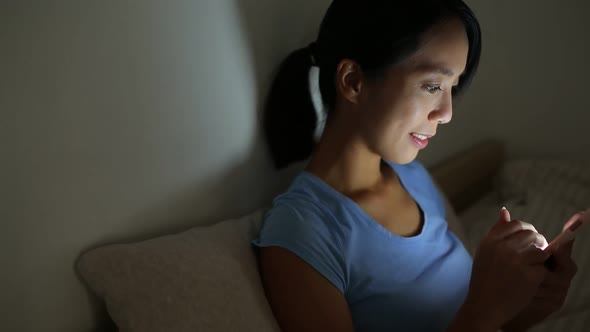 Woman using cellphone for online shopping