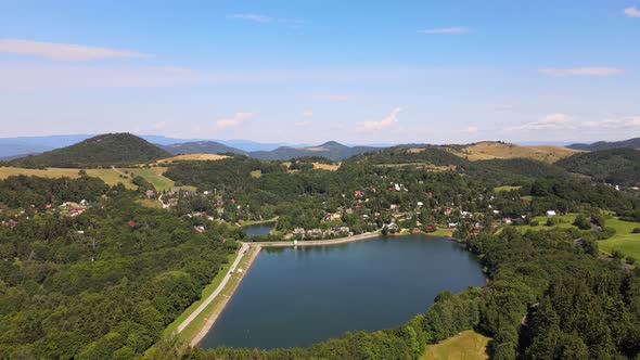 Aerial view of Vindsachtske lake in the village of Stiavnicke Bane in Slovakia