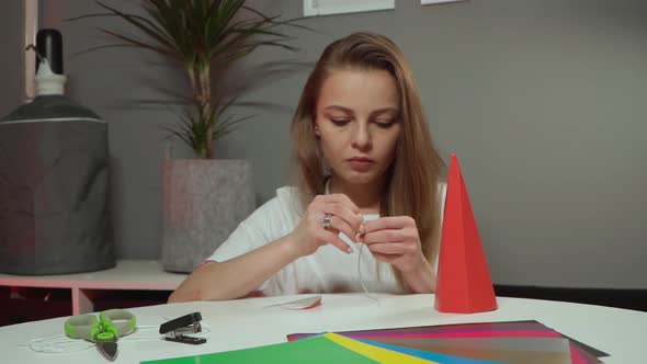 Girl Makes Cardboard Crafts for the Holiday