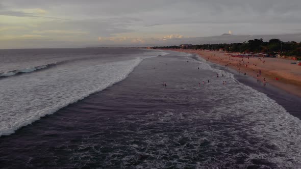 Flight at Sunset Overlooking the Indian Ocean in Bali Indonesia