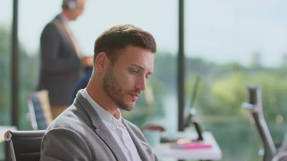 Man sitting office and busy working