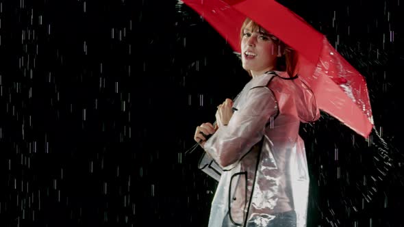 Beautiful Woman Dancing In The Rain