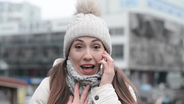 Portrait of Happy Woman Talking Phone