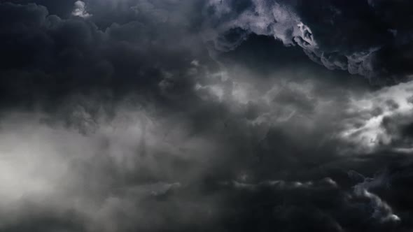 a thunderstorm accompanied by lightning that flashed , dark cumulus clouds