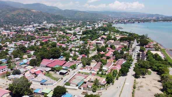 Rising drone footage of Dili, the Capital of Timor Leste in South East Asia