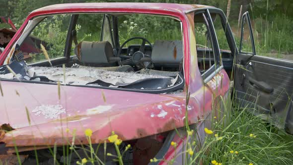 Rusty Broken Abandoned Car on Old Cars Junkyard Cemetery