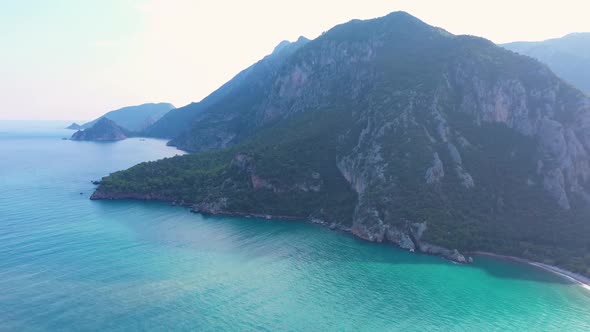 Aerial View of Rocky Mountains and Sea Bay