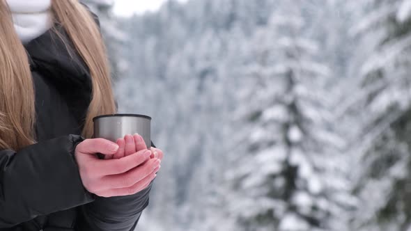 Girl Drinking Tea in the Winter Forest an Amazing Place with a Beautiful Snowcovered Forest