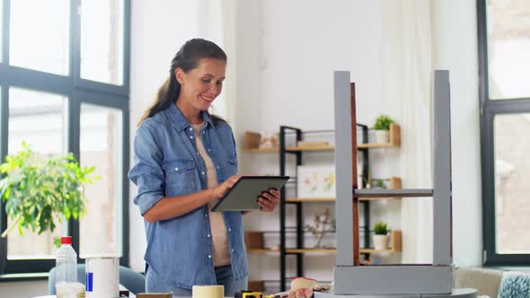 Woman with Tablet Pc and Old Table for Renovation