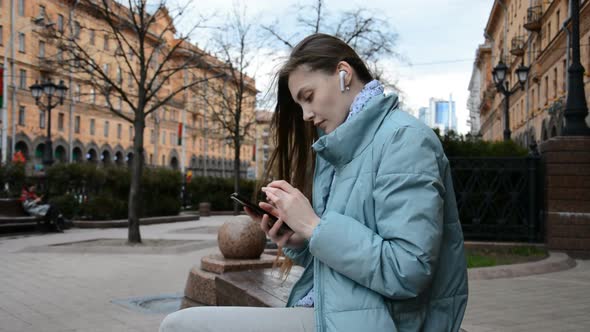 Young Woman with Smart Phone