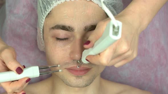 Microcurrent Face Therapy Young Man