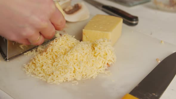 Girl Grate Cheese