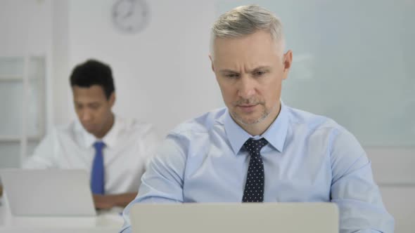 No Grey Hair Businessman Shaking Head to Reject Plan