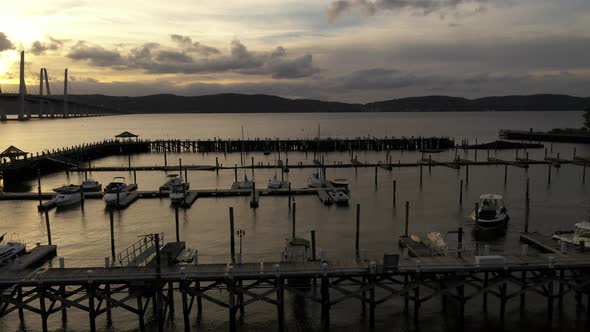 A low angle shot of the Tarrytown Marina in upstate NY. The Mario M. Cuomo Bridge in in the backgrou