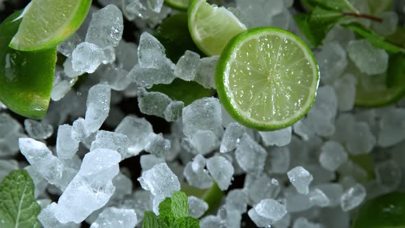 Super Slow Motion Shot of Exploding Crushed Ice Lime and Mint Towards Camera at 1000Fps