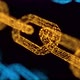 Blockchain cryptocurrency connected multi-function Gold chain particle closeup on Black background - VideoHive Item for Sale