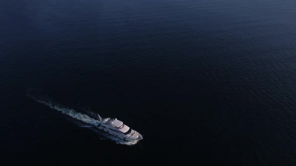 White Luxury Yacht Sails on the Ocean