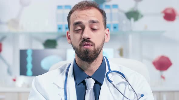 Close Up POV Shot of Doctor Head Talking with Other Scientist Via Video Call