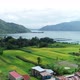 Drone view showing Lake Toba and rice fields, Humbang Hasundutan, North Sumatra Indonesia - VideoHive Item for Sale