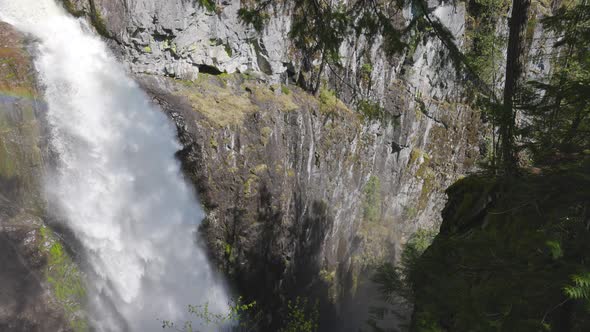 Waterfall Rushing Down a Rocky Canyon in the Canadian Mountains