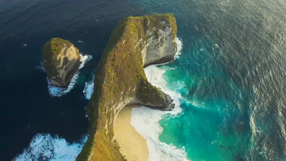 Kelingking Beach with Blue Sea at Nusa Penida Island, Bali, Indonesia, Aerial View 