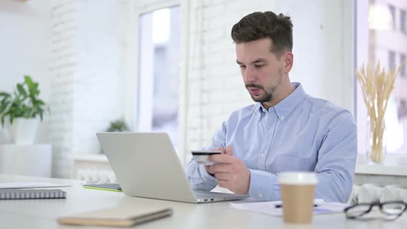 Successful Online Shopping, Man Making Online Payment on Desktop