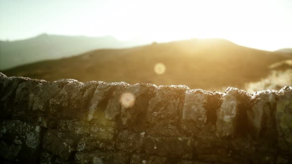 Scottish Land Border Stone Wall at Sunset